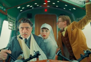still picture from the Phoenician Scheme featuring Benicio del Toro and some other actors lol.